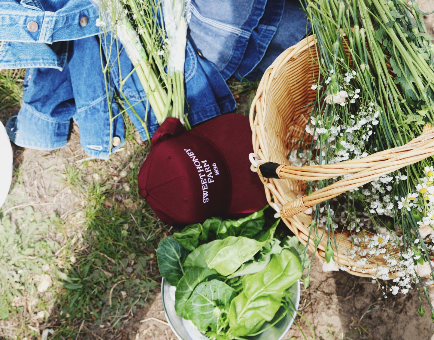 Maroon snapback hat with basket and greens – Sweet Honey Farm